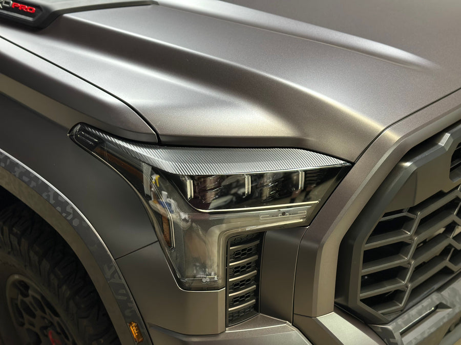 Carbon Fiber Headlight Eyelid Vinyl Overlays | 2022+ Toyota Tundra